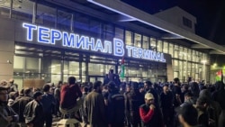 DAGESTAN -- Local people are seen during a pro-Palestinian rally at the Makhachkala Airport after the arrival of a scheduled flight from Tel Aviv.