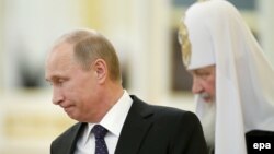 Президент России Владимир Путин и патриарх Кирилл