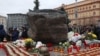 RUSSIA -- People take part in an annual ceremony honoring the memory of thousands of men and women executed by the Soviet authorities during Josef Stalin's Great Terror, at the Solovetsky Kamen (Solovki Stone) memorial on Lubyanka Square, in Moscow, Octob